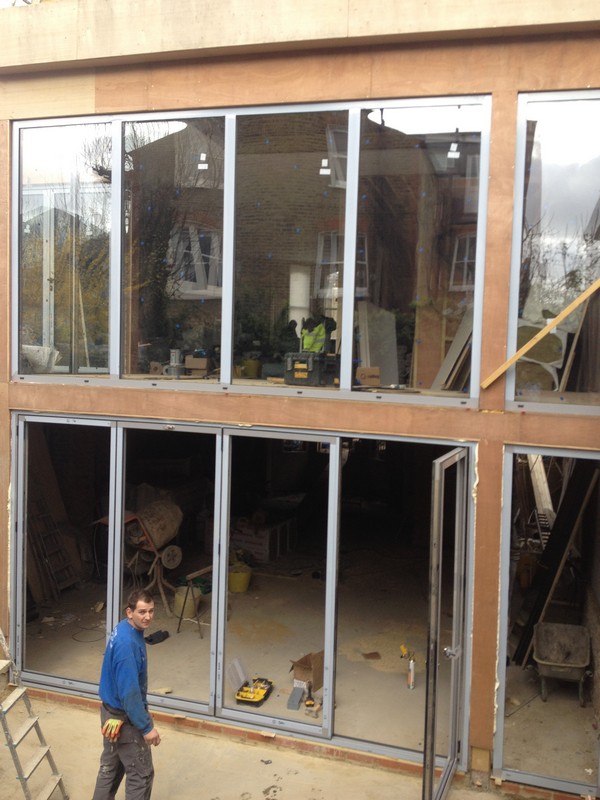 Aluminium bi-fold doors with two-storey glazing in Parson's Green