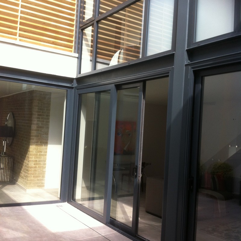 Anthracite aluminium sliding patio doors fitted in Parson's Green