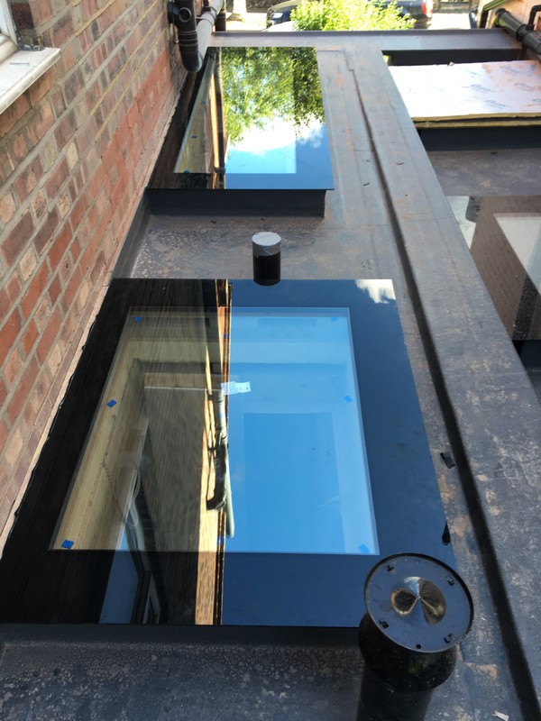Multiple flat roof skylights on extension in Parson's Green